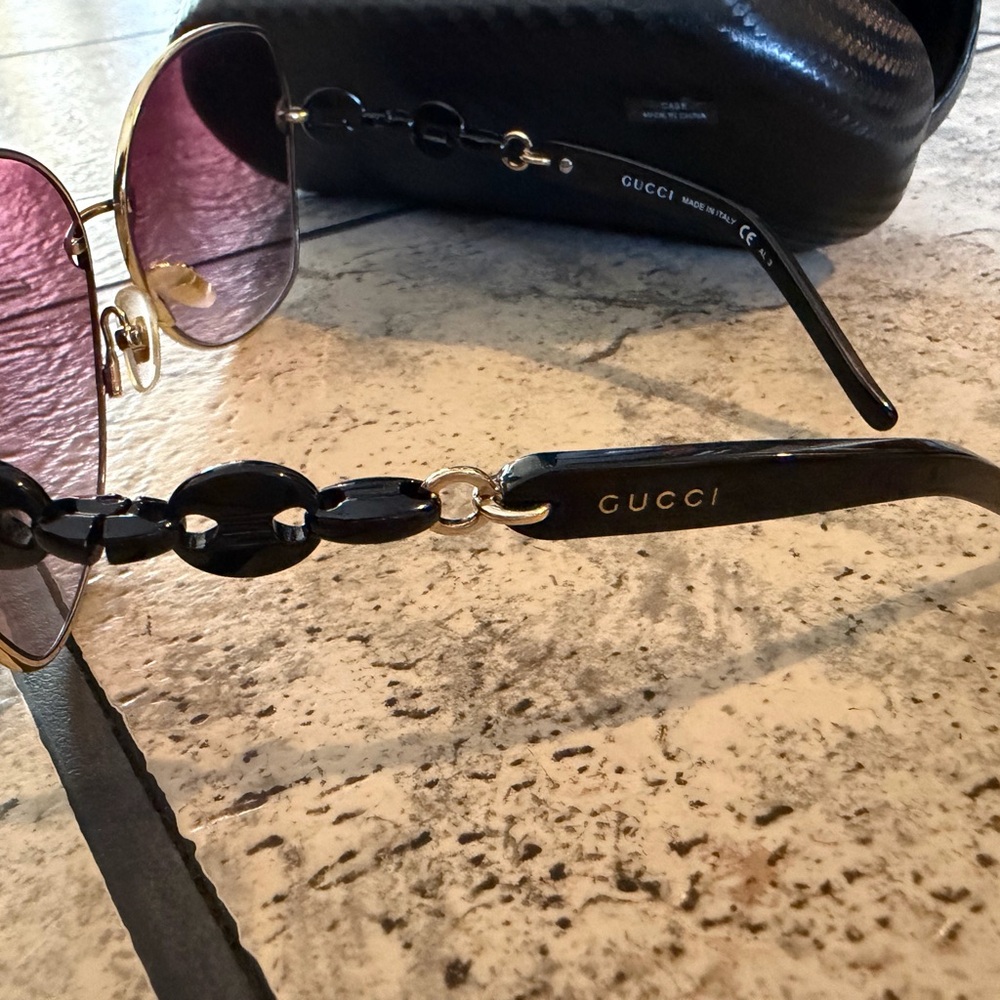 Gucci Black Sunglasses with Gold and Purple Details